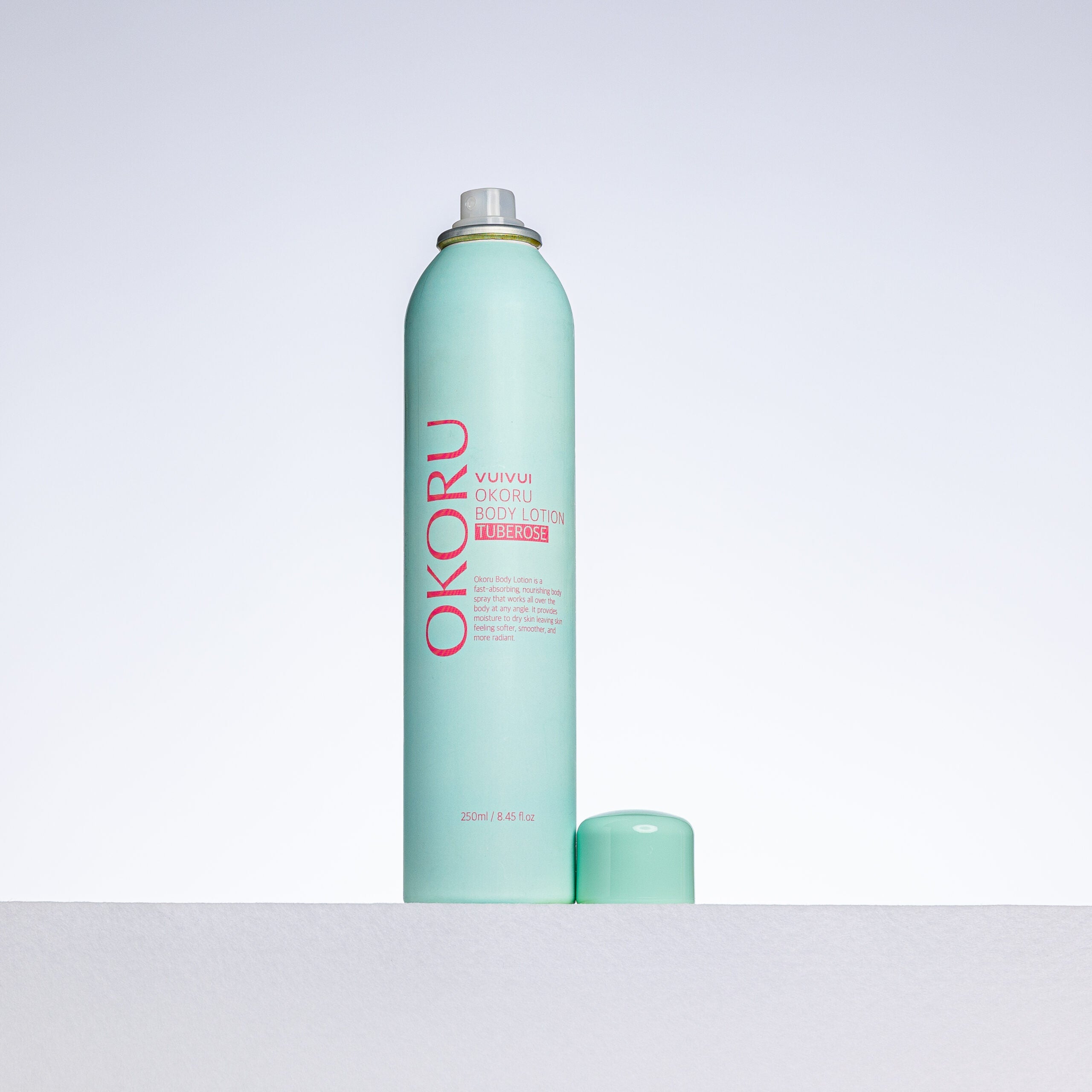 OKORU Tuberose spray body lotion bottle with spray nozzle detail