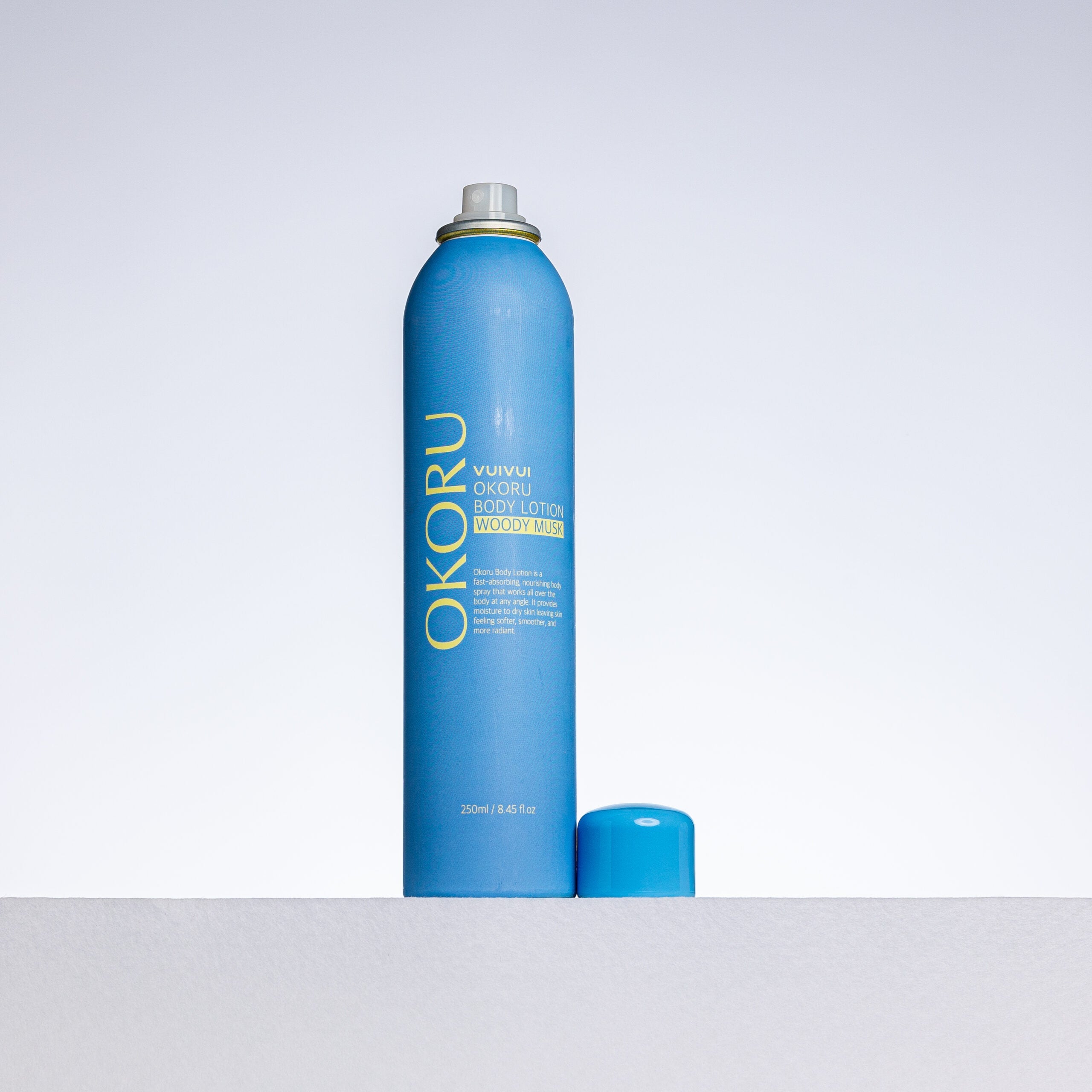 OKORU Woody Musk body lotion spray packaging detail