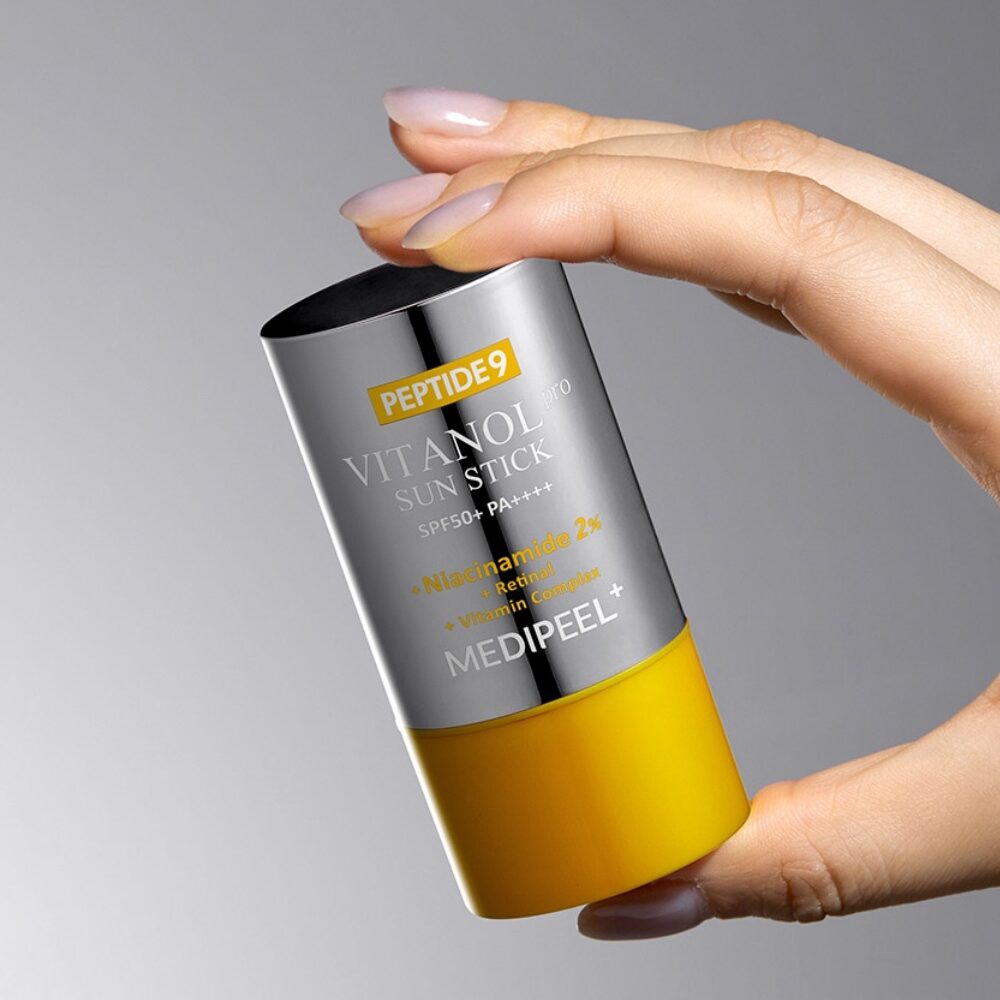 Medi-Peel Peptide 9 Vitanol Sun Stick packaging and twist-up applicator