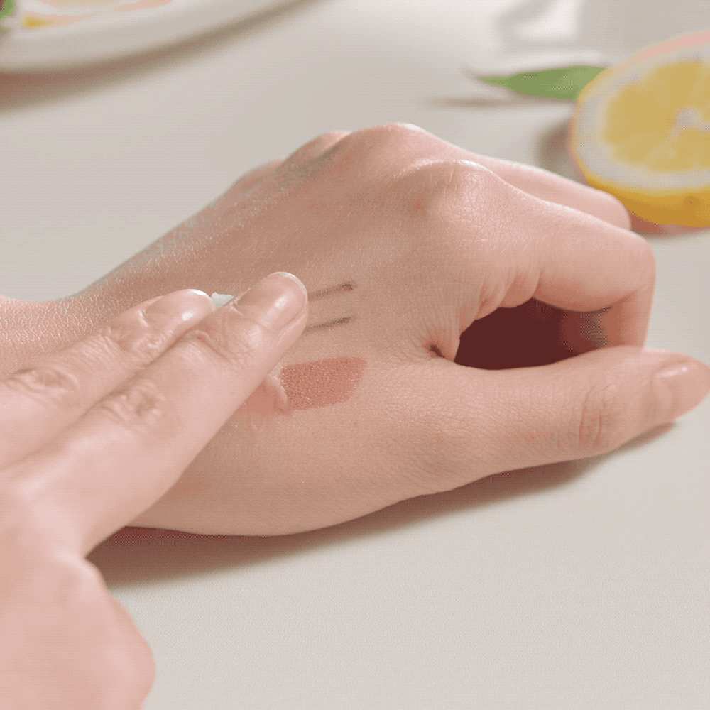 Fraijour Yuzu Honey All Cleansing Balm melting into oil