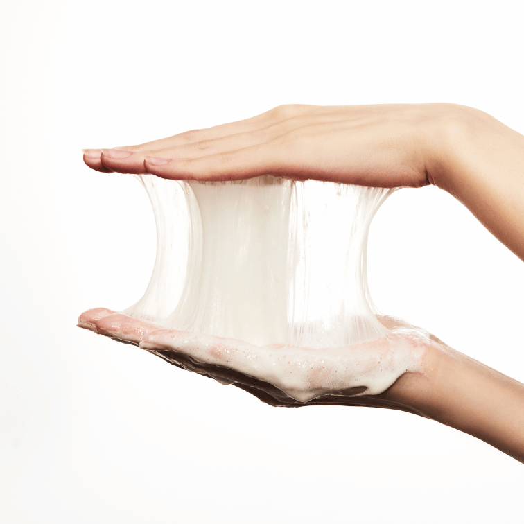 Anua Rice Enzyme Brightening Cleansing Powder lathered into creamy foam