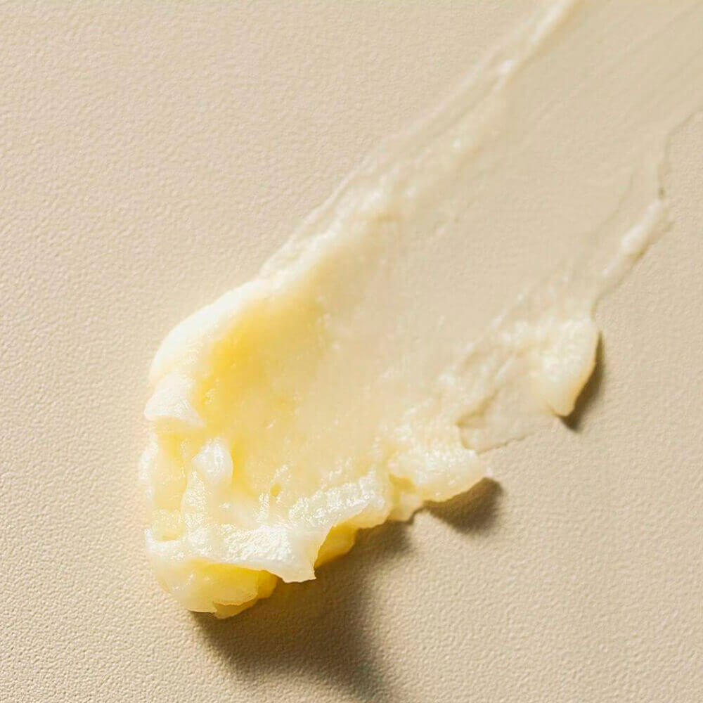 Fraijour Yuzu Honey All Cleansing Balm open jar with balm texture