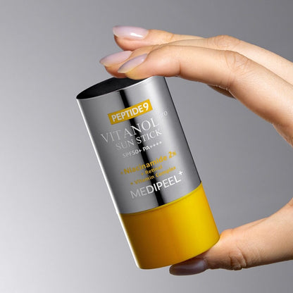 Medi-Peel Peptide 9 Vitanol Sun Stick packaging and twist-up applicator