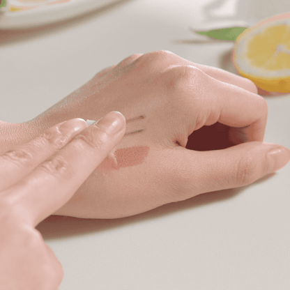 Fraijour Yuzu Honey All Cleansing Balm melting into oil