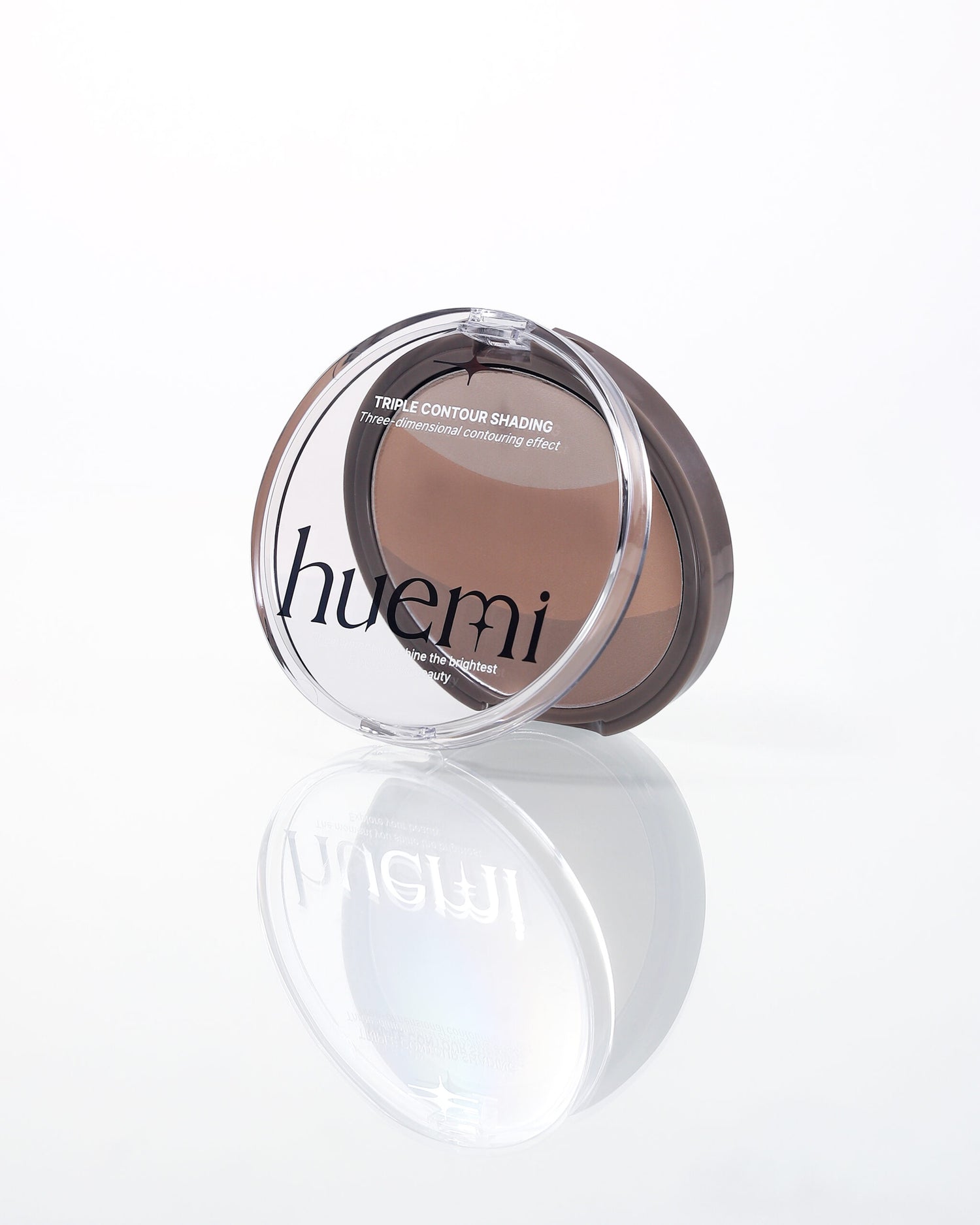 Swatches of HUEMI Triple Contour Shading on different skin tones