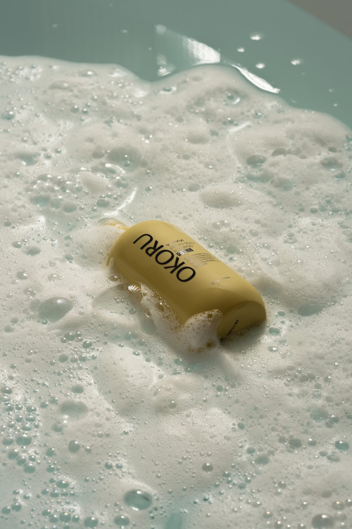 OKORU Scalp Shampoo Coco pump bottle from the side