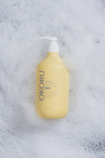 Rich ampoule-like texture of OKORU Silky Hair Treatment Coco