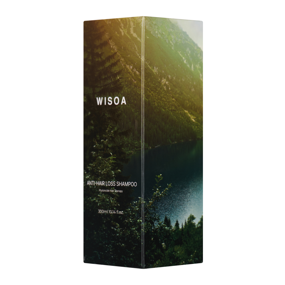 Wismin Wisoa shampoo bottle held to show its 300ml size